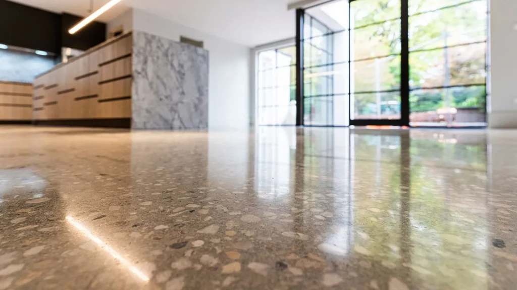 High-gloss polished concrete flooring in a commercial showroom